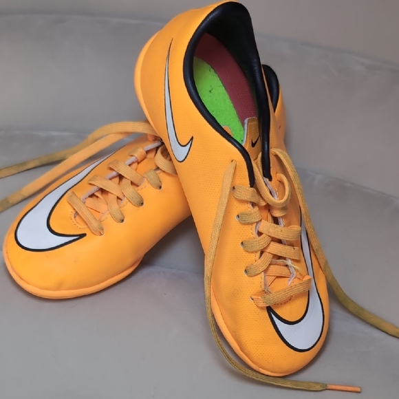 Nike Bright Orange Athletic Cleats - Picture 1 of 4